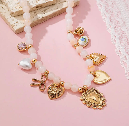 White Beaded Porcelain Heart Multi-
Charm Necklace